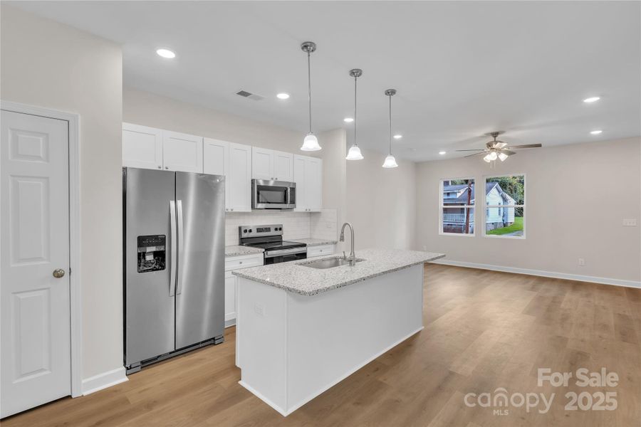 Furnished interior view inside a new home in , Statesville (Image 16).