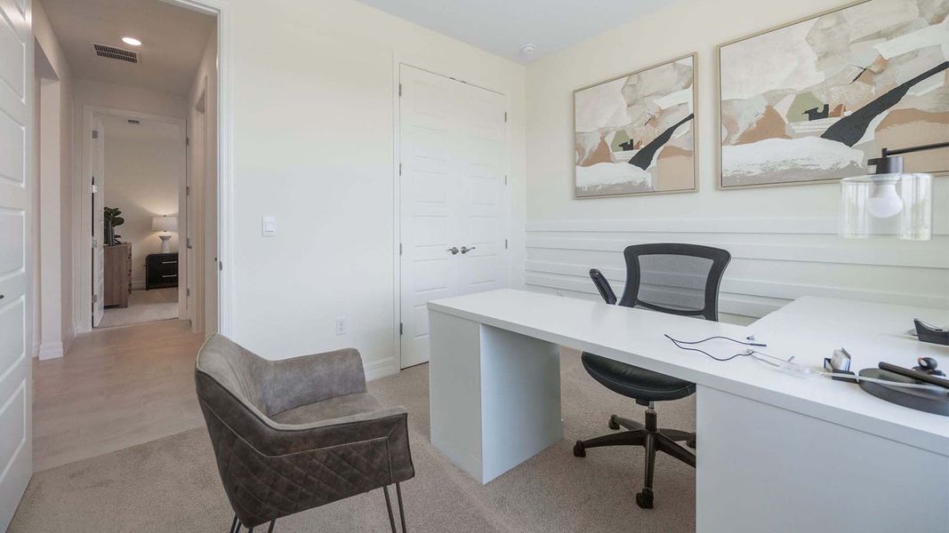 Representative furnished interior of a home built from the DELRAY by D.R. Horton in Lakes of Mount Dora, Mount Dora (Image 26).
