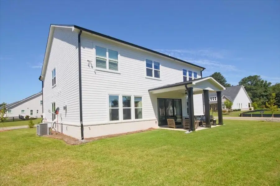 Exterior details and patio area of a home in , Cumming (Image 24).
