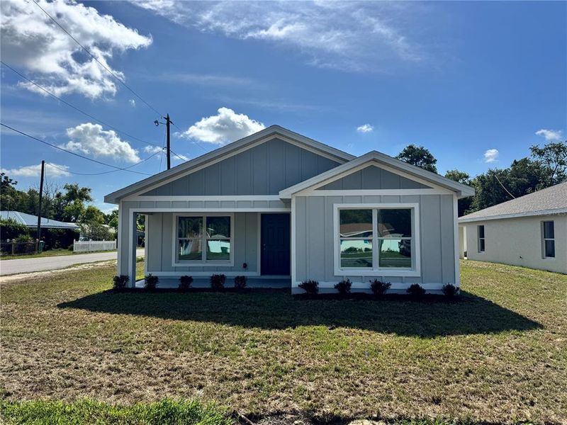 Front exterior of a new home in , Zephyrhills, FL, highlighting curb appeal (Image 2). Front exterior of a new home in , Zephyrhills, FL, highlighting curb appeal (Image 2).