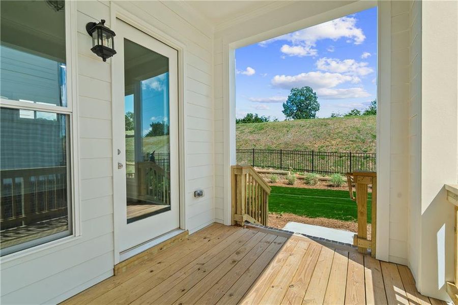 Exterior details and patio area of a home in Palisades Single Family, Cumming (Image 4).