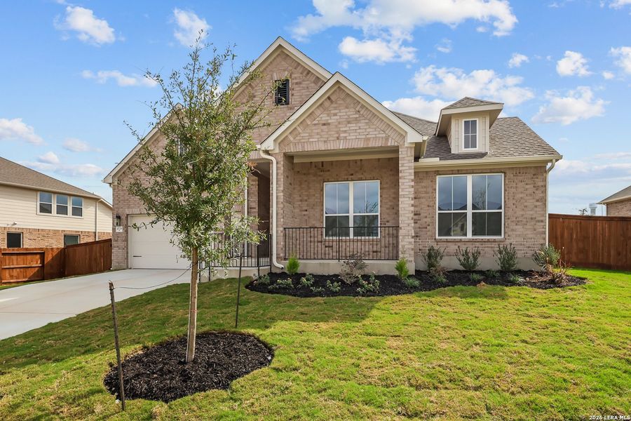 Front exterior of a new home in Homestead, Schertz, TX, highlighting curb appeal (Image 23).