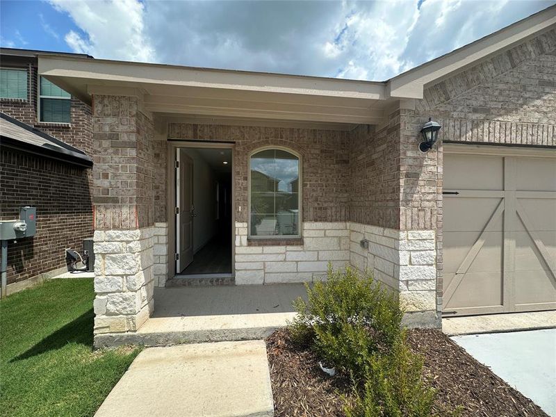 Front exterior of a new home in Cartwright Ranch, Crandall, TX, highlighting curb appeal (Image 14). Front exterior of a new home in Cartwright Ranch, Crandall, TX, highlighting curb appeal (Image 14).
