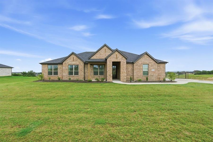 Front exterior of a new home in Gatlin Ranch, Springtown, TX, highlighting curb appeal (Image 20).