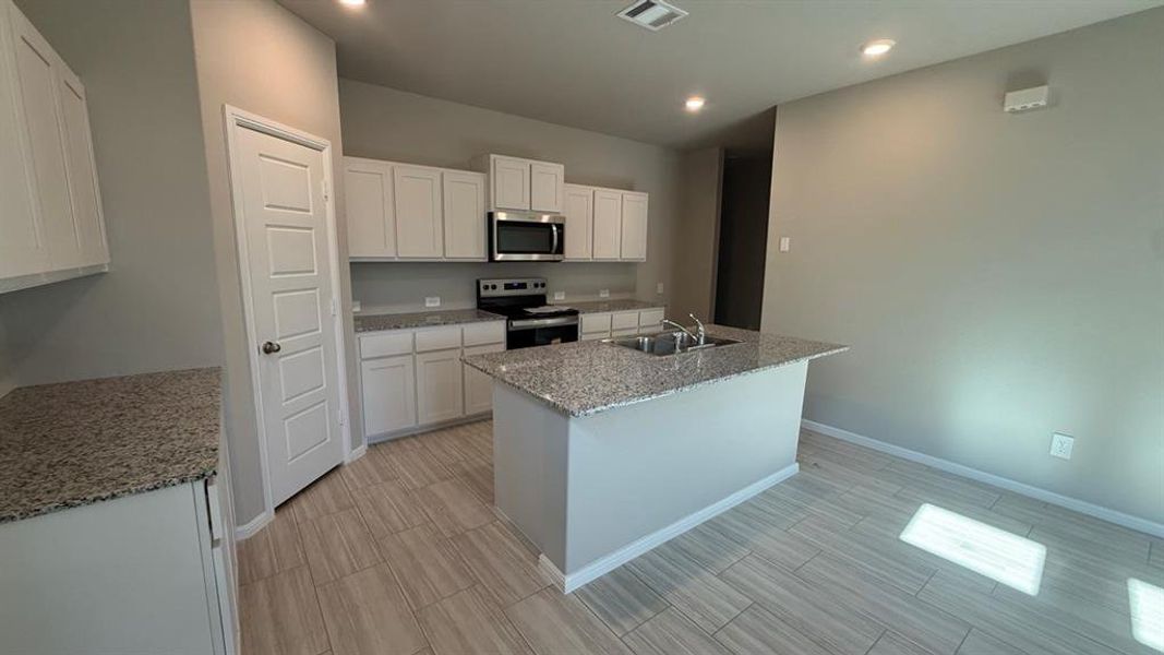 Kitchen - All Home and community information, including pricing, included features, terms, availability and amenities, are subject to change at any time without notice or obligation. All Drawings, pictures, photographs, video, square footages, floor plans, elevations, features, colors and sizes are approximate for illustration purposes only and will vary from the homes as built. Kitchen - All Home and community information, including pricing, included features, terms, availability and amenities, are subject to change at any time without notice or obligation. All Drawings, pictures, photographs, video, square footages, floor plans, elevations, features, colors and sizes are approximate for illustration purposes only and will vary from the homes as built.