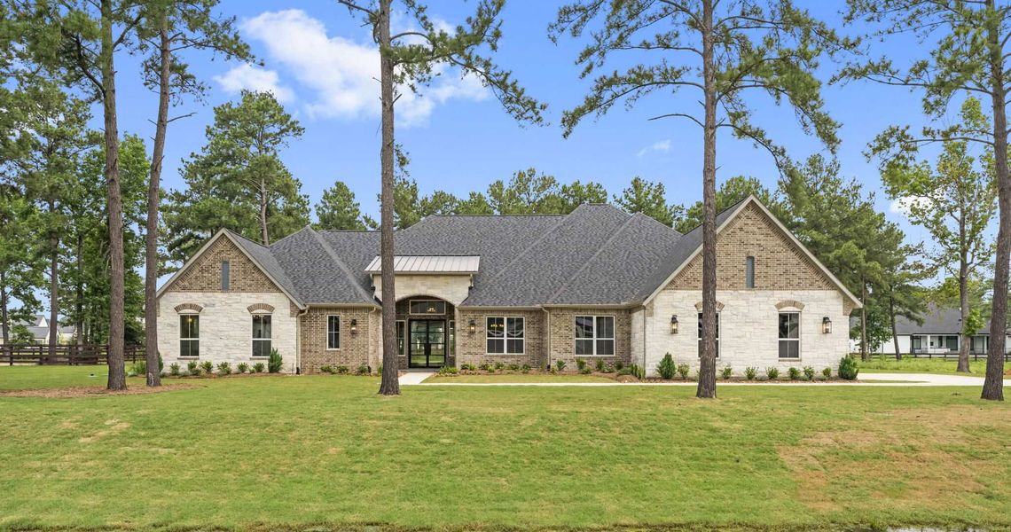 Representative exterior photo of a completed home built from the 4349 by Gracepoint Homes in Chapel Bend, Montgomery, TX (Image 2). Representative exterior photo of a completed home built from the 4349 by Gracepoint Homes in Chapel Bend, Montgomery, TX (Image 2).