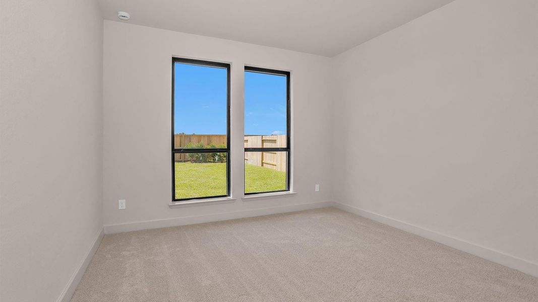 Spacious, unfurnished interior of a new home in Legacy Prairie at Katy Court, Katy (Image 8).