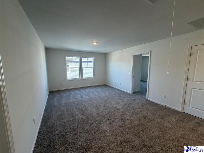 Spacious, unfurnished interior of a new home in The Grove, Florence (Image 24).