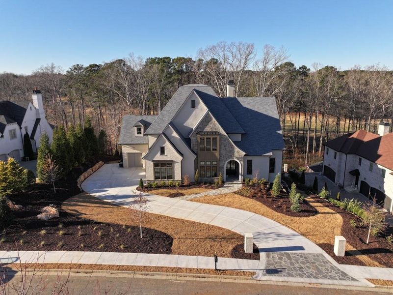 Front exterior of a new home in , Milton, GA, highlighting curb appeal (Image 34).