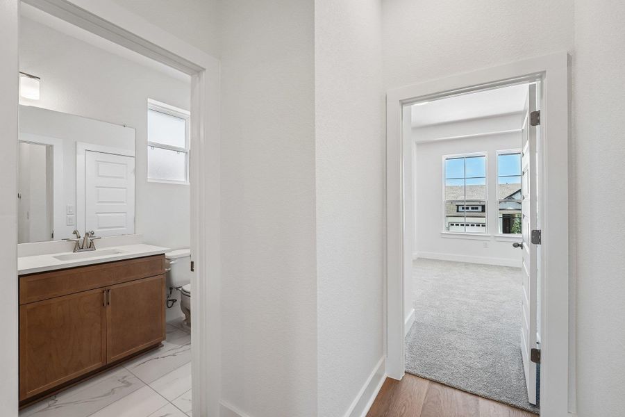Furnished interior view inside a new home in Persimmon, Buda (Image 5).