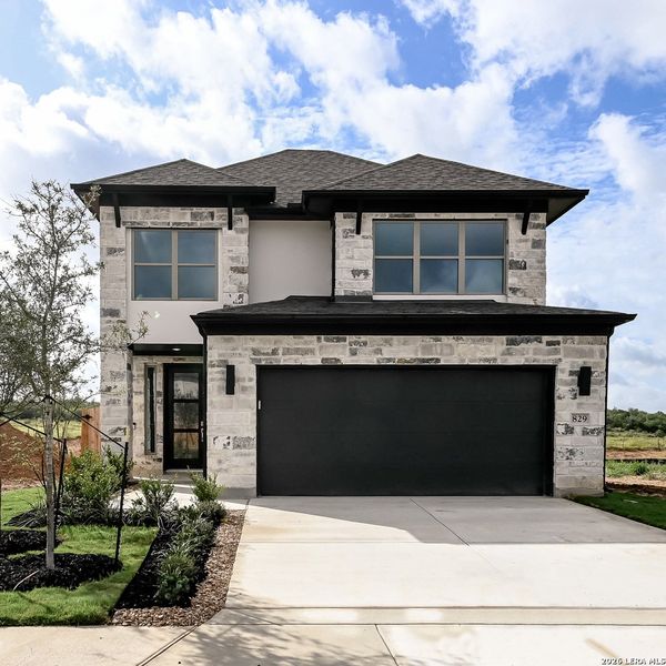 Front exterior of a new home in Legacy at Lake Dunlap, New Braunfels, TX, highlighting curb appeal (Image 21).