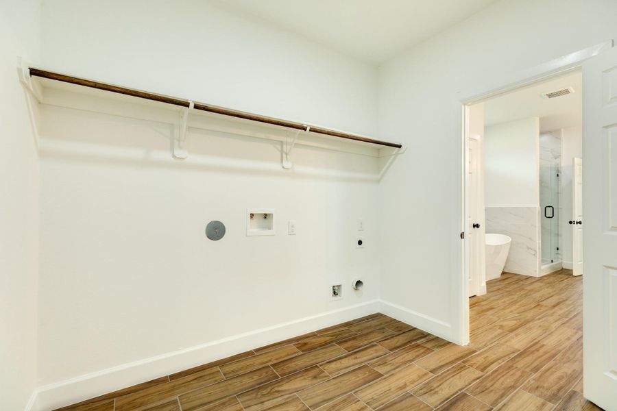 Huge laundry room located just off the en-suite for convenience