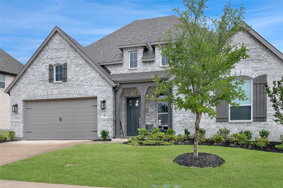 Front exterior of a new home in , Van Alstyne, TX, highlighting curb appeal (Image 25).