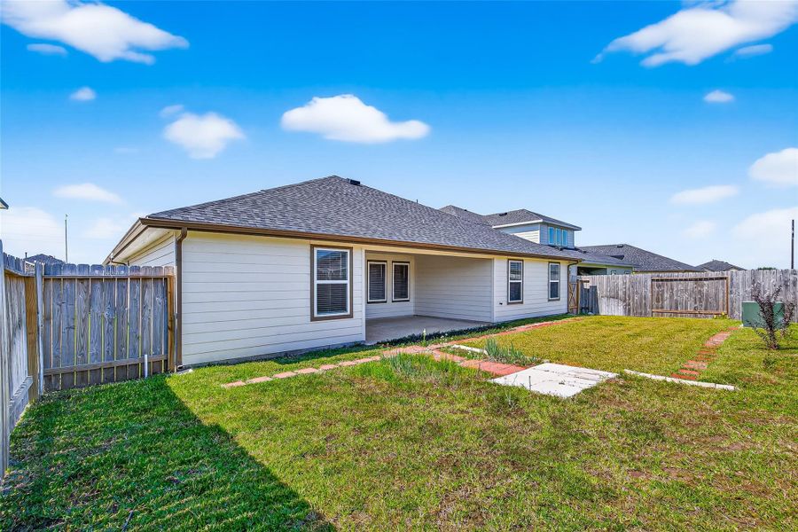 Exterior details and patio area of a home in Windstone on the Prairie, Richmond (Image 22).