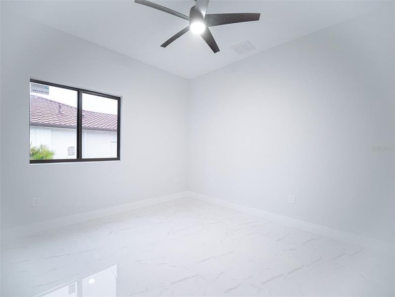 Spacious, unfurnished interior of a new home in , Port Charlotte (Image 33).