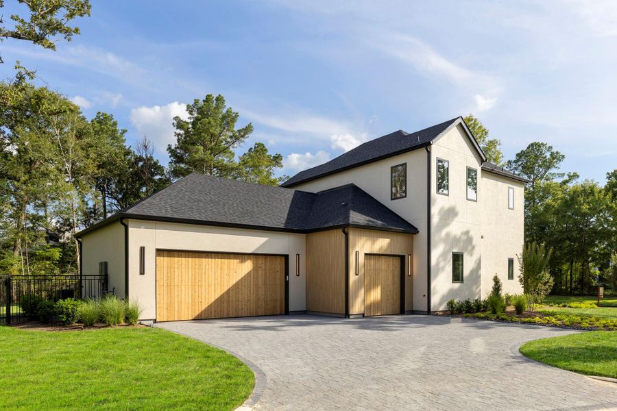 Front exterior of a new home in , Montgomery, TX, highlighting curb appeal (Image 25). Front exterior of a new home in , Montgomery, TX, highlighting curb appeal (Image 25).