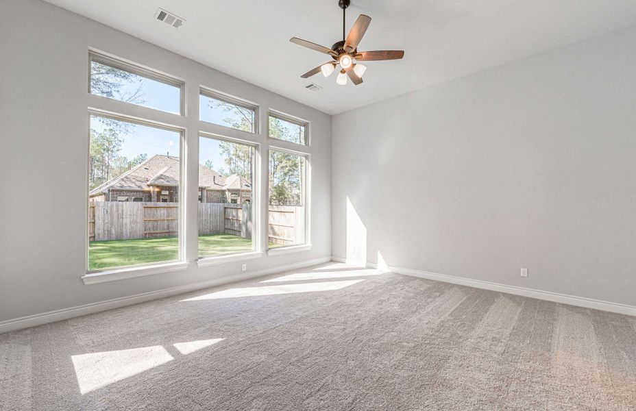 Representative unfurnished interior of a home built from the 3358 by Ravenna Homes in Artavia 70′, Conroe (Image 43).