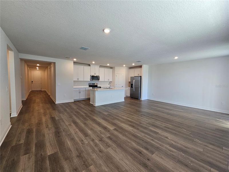 Spacious, unfurnished interior of a new home in The Reserve at Hammock Oaks - Signature Series, Lady Lake (Image 26).