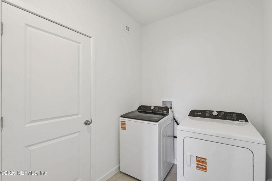 Furnished interior view inside a new home in Flagler Village - Signature Series, Palm Coast (Image 13).