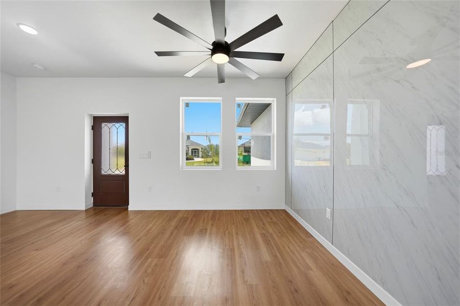 Spacious, unfurnished interior of a new home in , Port Charlotte (Image 27).