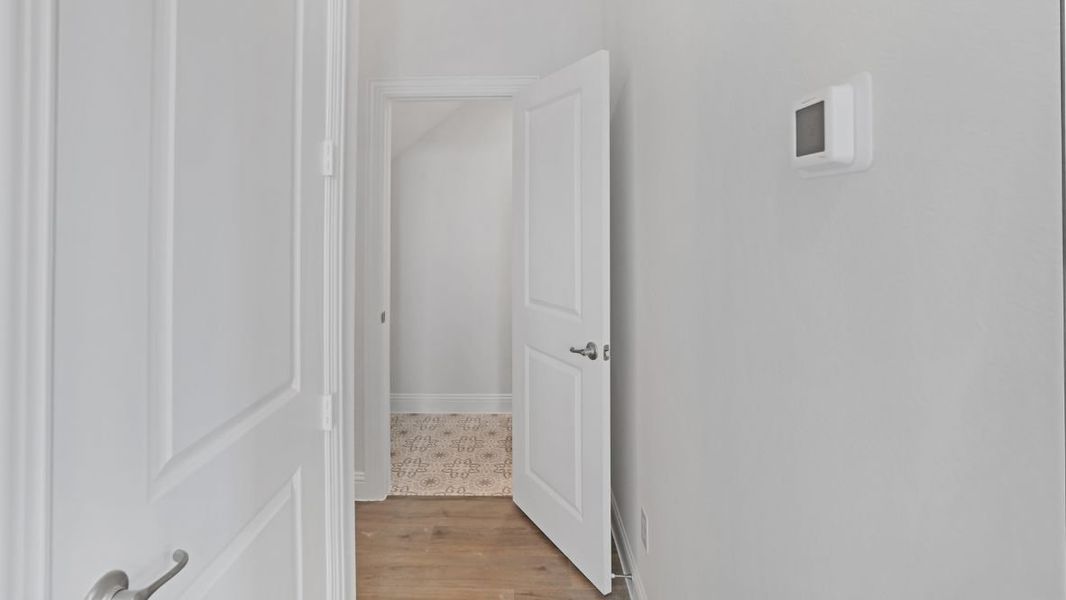 Representative unfurnished interior of a home built from the Appaloosa by D.R. Horton in The Avenue, Allen (Image 19).