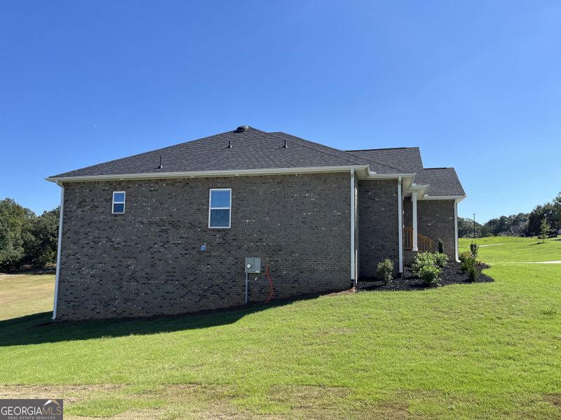 Exterior details and patio area of a home in Oakview Estates, Macon (Image 3).