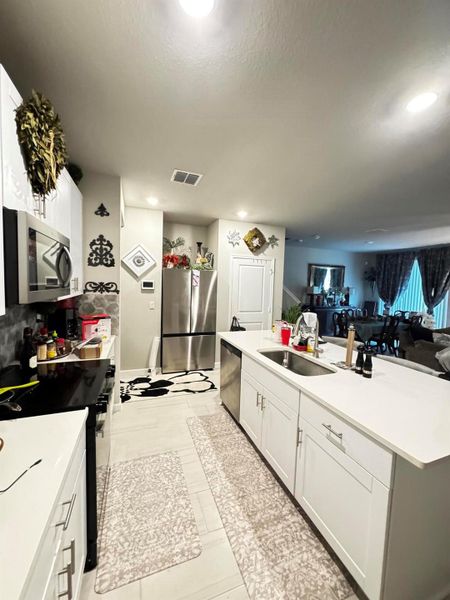 Furnished interior view inside a new home in , Stuart (Image 12).