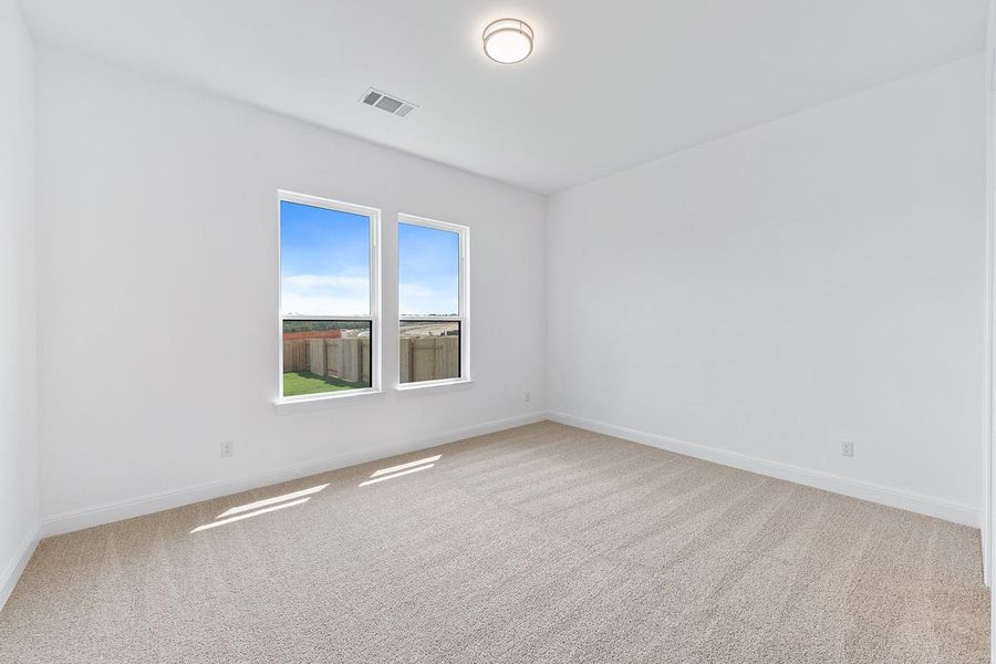 Spacious, unfurnished interior of a new home in Lariat - 80', Liberty Hill (Image 15). Spacious, unfurnished interior of a new home in Lariat - 80', Liberty Hill (Image 15).