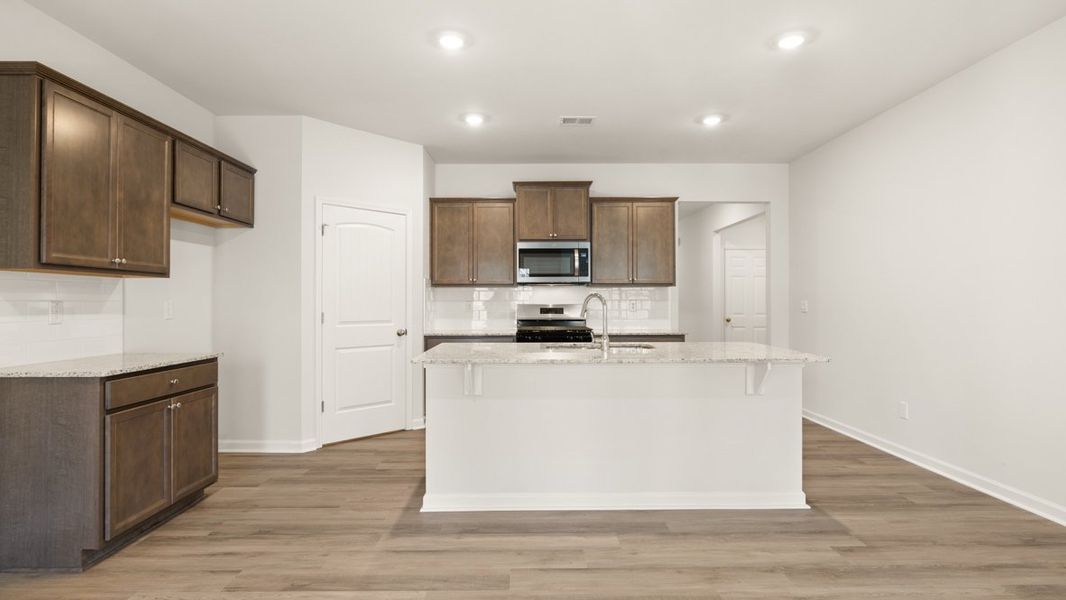 Representative furnished interior of a home built from the Cali by D.R. Horton in South Wind, South Fulton (Image 8).
