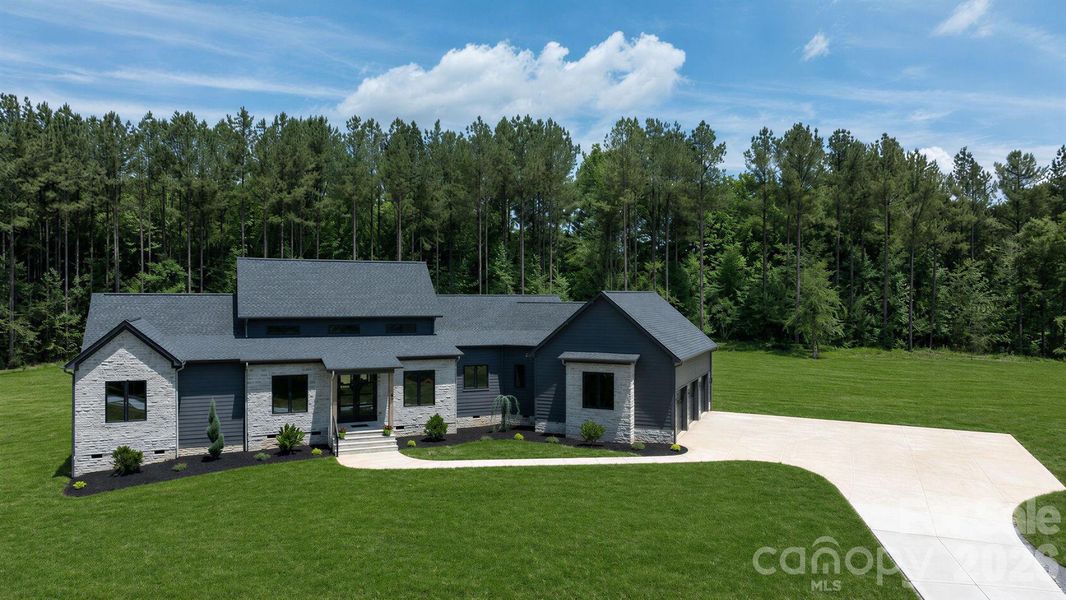 Front exterior of a new home in , Rock Hill, SC, highlighting curb appeal (Image 29).
