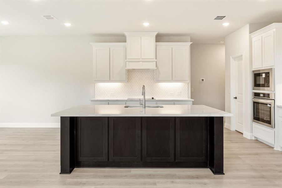 Furnished interior view inside a new home in Mockingbird Hills 60-65, Joshua (Image 14).