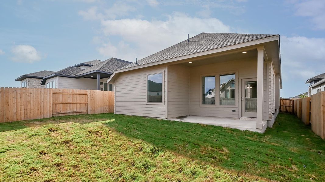Exterior details and patio area of a home in Crosswinds 40', Kyle (Image 2).
