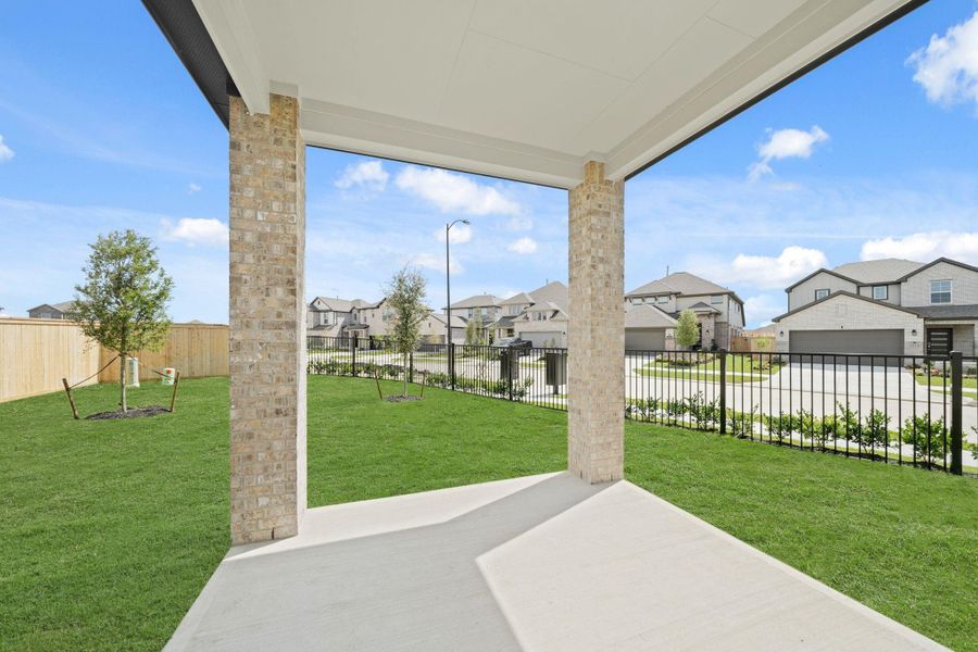 Exterior details and patio area of a home in Creekland Village at Bridgeland, Cypress (Image 4).