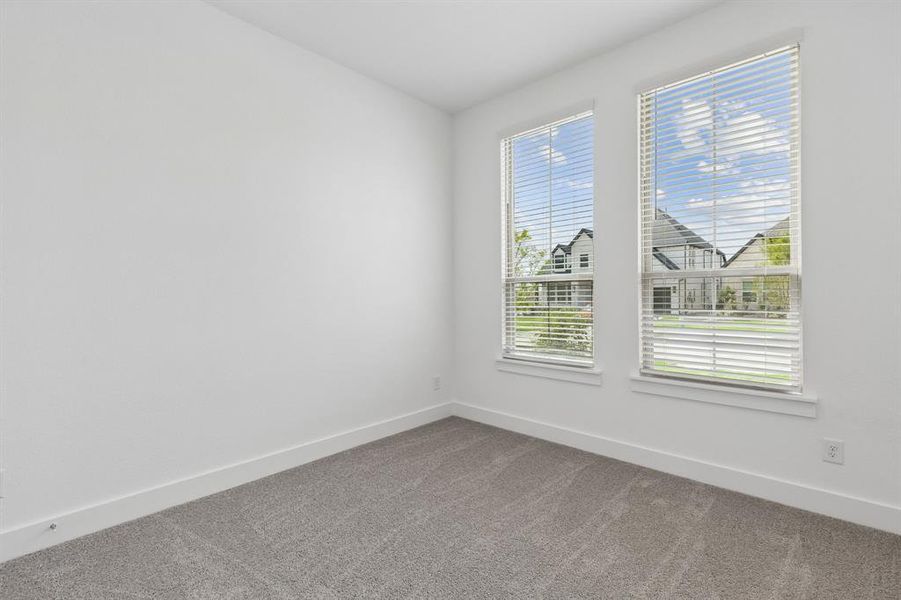 Spacious, unfurnished interior of a new home in Painted Tree Woodland West, McKinney (Image 24).