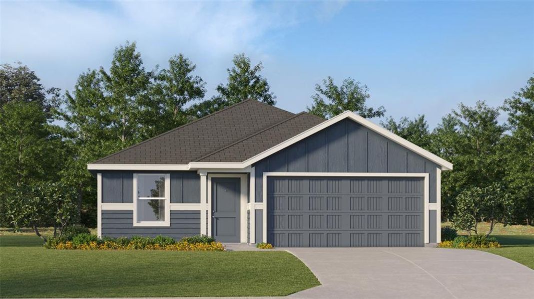 View of front of house with a front lawn and a garage