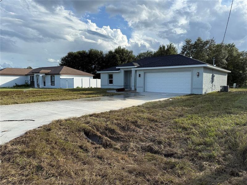Front exterior of a new home in , Ocala, FL, highlighting curb appeal (Image 1). Front exterior of a new home in , Ocala, FL, highlighting curb appeal (Image 1).
