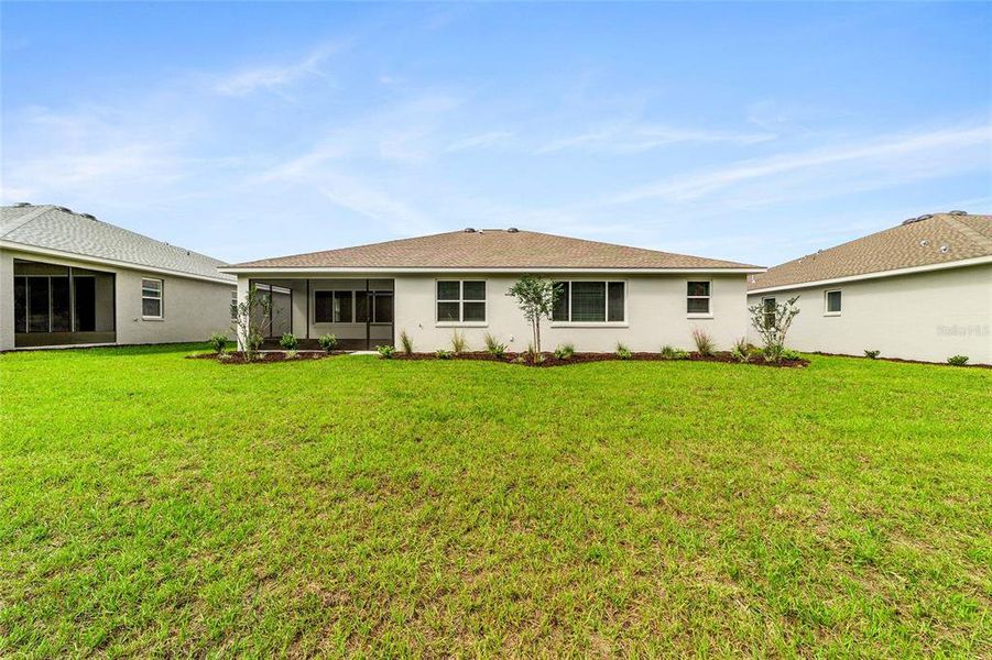 Exterior details and patio area of a home in On Top of the World Communities, Ocala (Image 3).