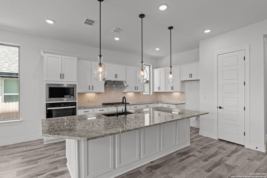 Furnished interior view inside a new home in Bison Ridge, San Antonio (Image 4).