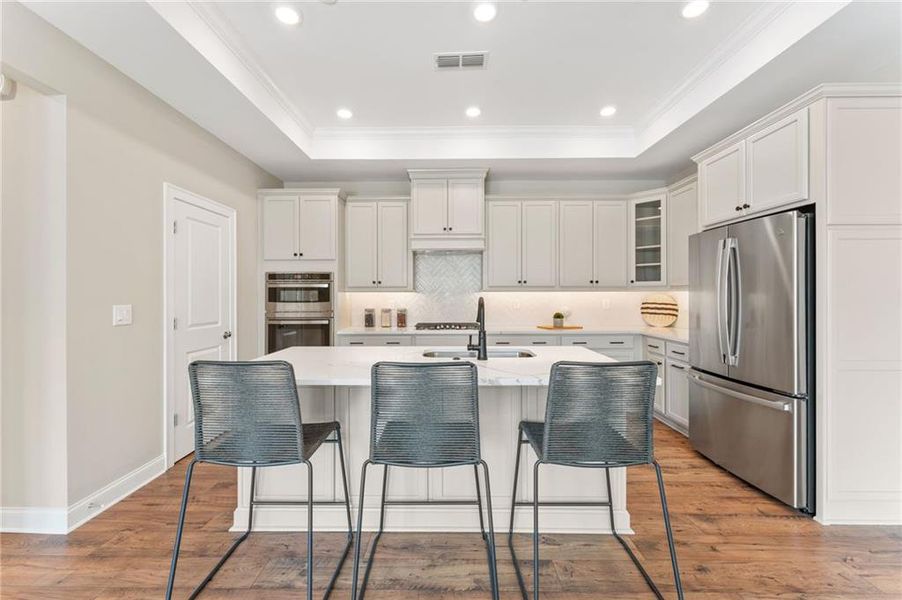 Furnished interior view inside a new home in The Courtyards of Franklin Goldmine, Cumming (Image 11).