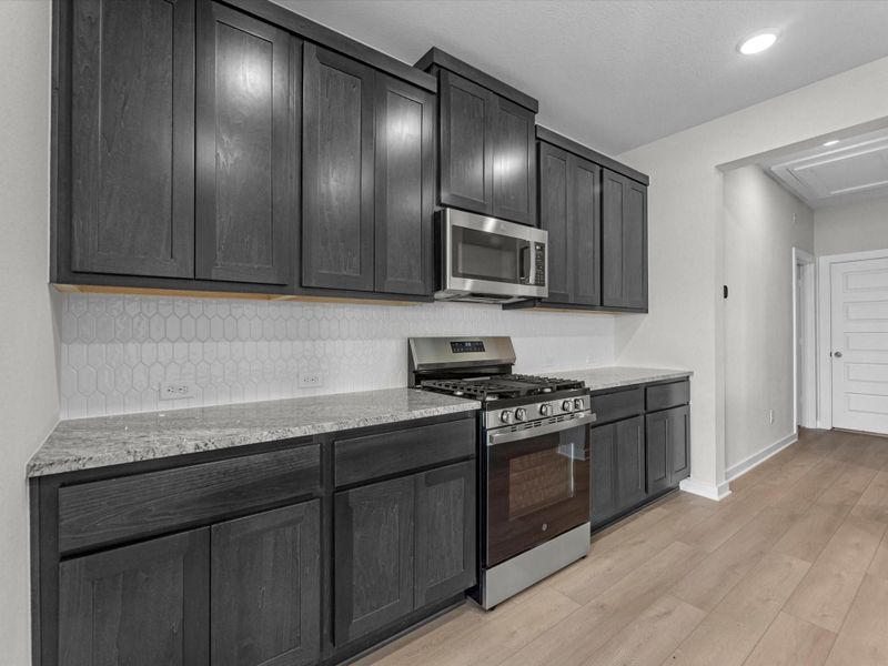 Furnished interior view inside a new home in Mason Woods, Cypress (Image 6).