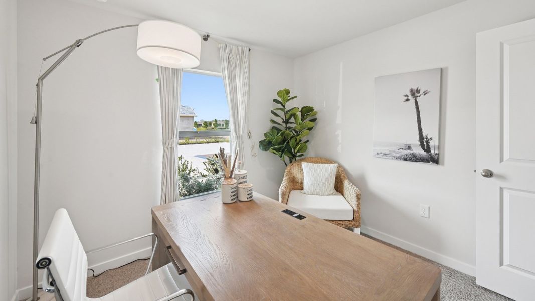 Furnished interior view inside a new home in Cove at West Port - Express, Port Charlotte (Image 16).