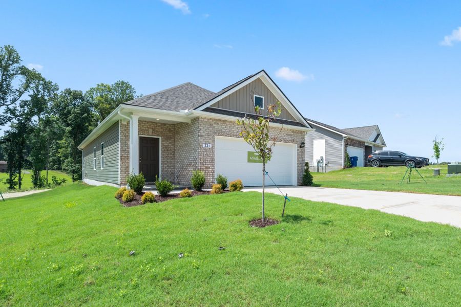 Front exterior of a new home in Jackson Hills, Clarksville, TN, highlighting curb appeal (Image 14).