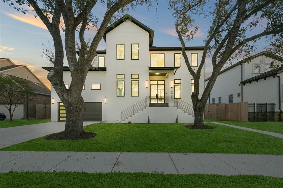 Discover the perfect blend of contemporary design and warm character in this stunning new construction home located in the heart of Meyerland.