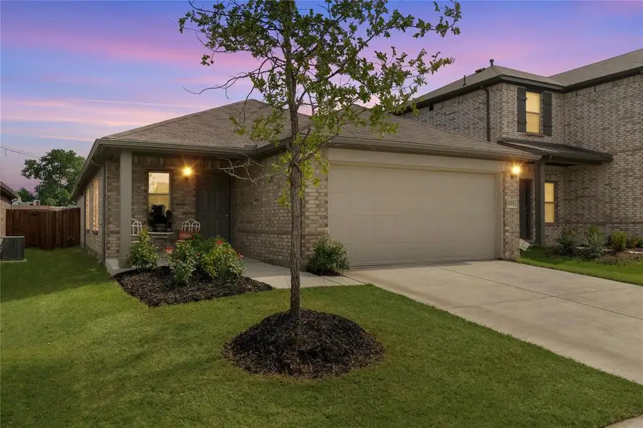 Front exterior of a new home in Esperanza, Mesquite, TX, highlighting curb appeal (Image 21). Front exterior of a new home in Esperanza, Mesquite, TX, highlighting curb appeal (Image 21).