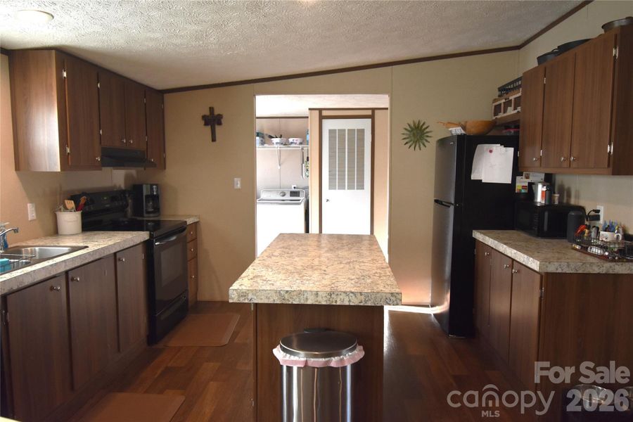 Furnished interior view inside a new home in , Lenoir (Image 27).