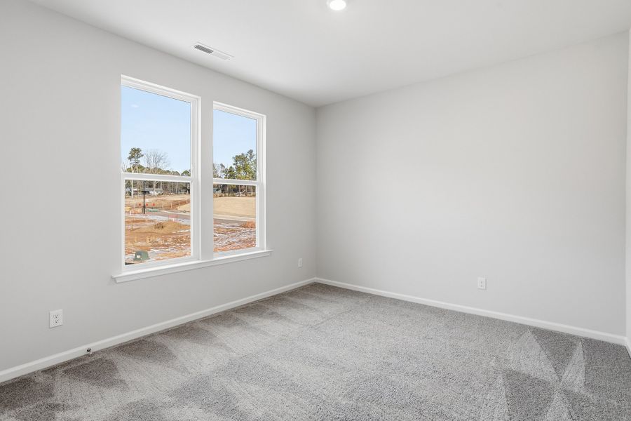 Spacious, unfurnished interior of a new home in Ovation at Sweetbrier, Durham (Image 27).