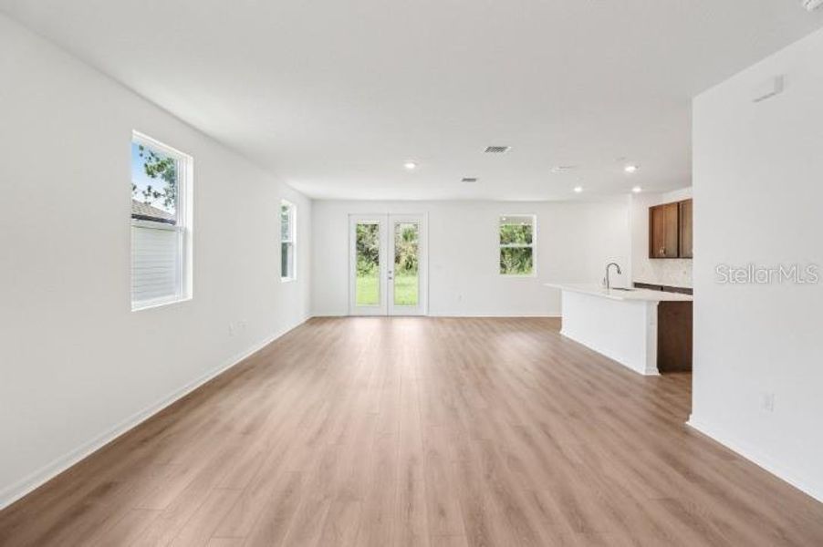 Spacious, unfurnished interior of a new home in Northlake at Ovation, Winter Garden (Image 13).