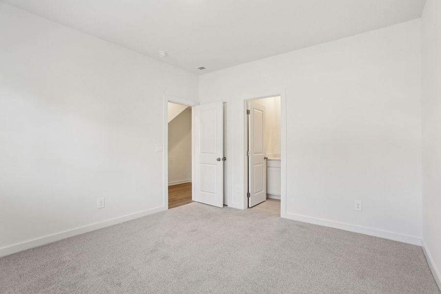 Spacious, unfurnished interior of a new home in Greystone - Highland Townhomes, Smyrna (Image 15).