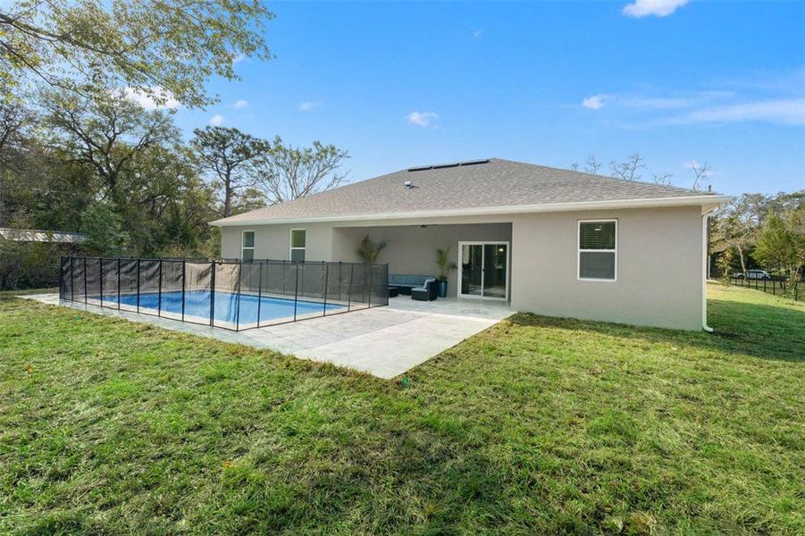 Exterior details and patio area of a home in , Spring Hill (Image 24).