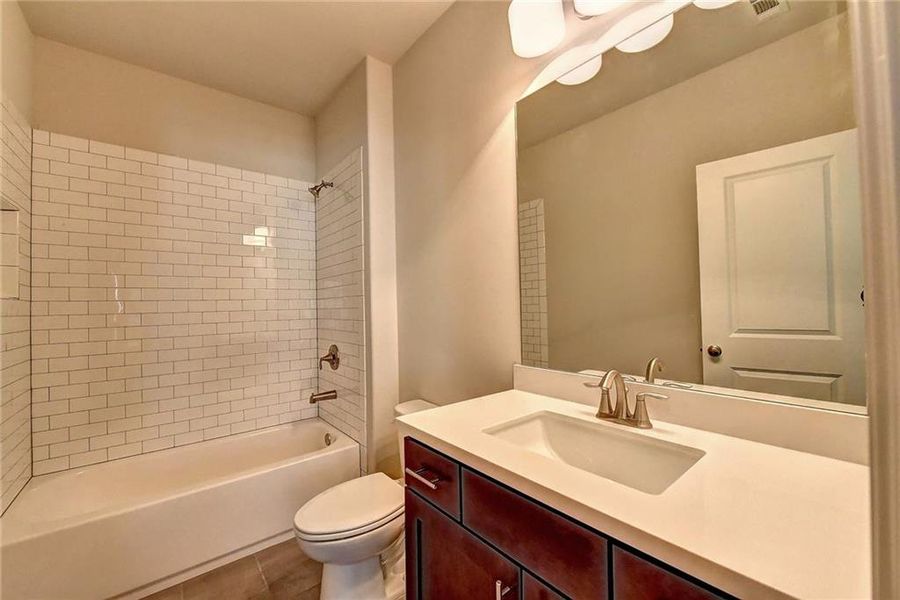 Furnished interior view inside a new home in Bellmoore Park, Duluth (Image 38).